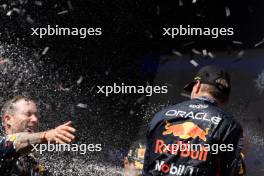Race winner Max Verstappen (NLD) Red Bull Racing celebrates on the podium with Greg Reeson (GBR) Red Bull Racing Tyre Technician. 30.07.2023. Formula 1 World Championship, Rd 13, Belgian Grand Prix, Spa Francorchamps, Belgium, Race Day.