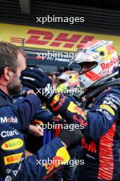 Race winner Max Verstappen (NLD) Red Bull Racing celebrates with the team in parc ferme. 30.07.2023. Formula 1 World Championship, Rd 13, Belgian Grand Prix, Spa Francorchamps, Belgium, Race Day.