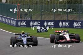 Logan Sargeant (USA) Williams Racing FW45 and Nico Hulkenberg (GER) Haas VF-23. 30.07.2023. Formula 1 World Championship, Rd 13, Belgian Grand Prix, Spa Francorchamps, Belgium, Race Day.