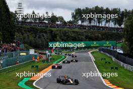 Sergio Perez (MEX) Red Bull Racing RB19 leads at the start of the race. 30.07.2023. Formula 1 World Championship, Rd 13, Belgian Grand Prix, Spa Francorchamps, Belgium, Race Day.