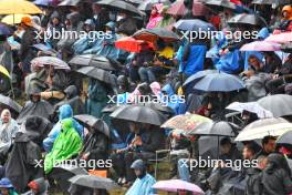 Circuit atmosphere - fans in the rain. 29.07.2023. Formula 1 World Championship, Rd 13, Belgian Grand Prix, Spa Francorchamps, Belgium, Sprint Day.