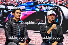(L to R): Esteban Ocon (FRA) Alpine F1 Team and Pierre Gasly (FRA) Alpine F1 Team on the FanZone Stage. 29.07.2023. Formula 1 World Championship, Rd 13, Belgian Grand Prix, Spa Francorchamps, Belgium, Sprint Day.