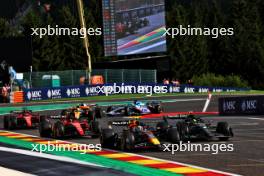 Sergio Perez (MEX) Red Bull Racing RB19 and Lewis Hamilton (GBR) Mercedes AMG F1 W14 battle for position. 29.07.2023. Formula 1 World Championship, Rd 13, Belgian Grand Prix, Spa Francorchamps, Belgium, Sprint Day.