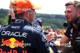 (L to R): Max Verstappen (NLD) Red Bull Racing celebrates first position in Sprint Qualifying with Bradley Scanes (GBR) Red Bull Racing Physio and Performance Coach. 29.07.2023. Formula 1 World Championship, Rd 13, Belgian Grand Prix, Spa Francorchamps, Belgium, Sprint Day.