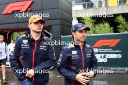 (L to R): Max Verstappen (NLD) Red Bull Racing and team mate Sergio Perez (MEX) Red Bull Racing. 29.07.2023. Formula 1 World Championship, Rd 13, Belgian Grand Prix, Spa Francorchamps, Belgium, Sprint Day.