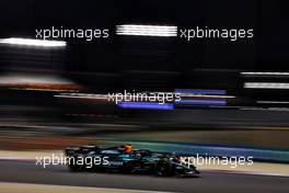 Lance Stroll (CDN) Aston Martin F1 Team AMR23 and Sergio Perez (MEX) Red Bull Racing RB19. 03.03.2023. Formula 1 World Championship, Rd 1, Bahrain Grand Prix, Sakhir, Bahrain, Practice Day