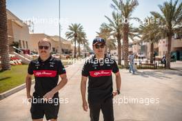 (L to R): Valtteri Bottas (FIN) Alfa Romeo F1 Team with team mate Zhou Guanyu (CHN) Alfa Romeo F1 Team. 03.03.2023. Formula 1 World Championship, Rd 1, Bahrain Grand Prix, Sakhir, Bahrain, Practice Day