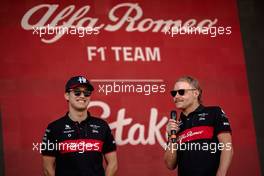 (L to R): Zhou Guanyu (CHN) Alfa Romeo F1 Team and Valtteri Bottas (FIN) Alfa Romeo F1 Team on the FanZone Stage. 03.03.2023. Formula 1 World Championship, Rd 1, Bahrain Grand Prix, Sakhir, Bahrain, Practice Day