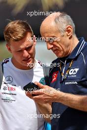 (L to R): Mick Schumacher (GER) Mercedes AMG F1 Reserve Driver with Franz Tost (AUT) AlphaTauri Team Principal. 03.03.2023. Formula 1 World Championship, Rd 1, Bahrain Grand Prix, Sakhir, Bahrain, Practice Day