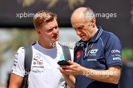 (L to R): Mick Schumacher (GER) Mercedes AMG F1 Reserve Driver with Franz Tost (AUT) AlphaTauri Team Principal. 03.03.2023. Formula 1 World Championship, Rd 1, Bahrain Grand Prix, Sakhir, Bahrain, Practice Day