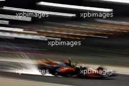 Lando Norris (GBR) McLaren MCL60 sends sparks flying. 03.03.2023. Formula 1 World Championship, Rd 1, Bahrain Grand Prix, Sakhir, Bahrain, Practice Day