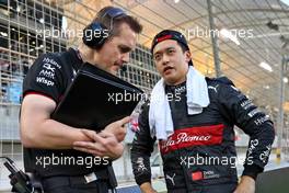 Zhou Guanyu (CHN) Alfa Romeo F1 Team with Jorn Becker, Alfa Romeo F1 Team Race Engineer on the grid. 05.03.2023. Formula 1 World Championship, Rd 1, Bahrain Grand Prix, Sakhir, Bahrain, Race Day.