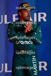 Fernando Alonso (ESP) Aston Martin F1 Team celebrates his third position on the podium. 05.03.2023. Formula 1 World Championship, Rd 1, Bahrain Grand Prix, Sakhir, Bahrain, Race Day.