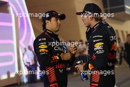 (L to R): Second placed Sergio Perez (MEX) Red Bull Racing with team mate and race winner Max Verstappen (NLD) Red Bull Racing in parc ferme. 05.03.2023. Formula 1 World Championship, Rd 1, Bahrain Grand Prix, Sakhir, Bahrain, Race Day.