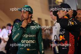 (L to R): third placed Fernando Alonso (ESP) Aston Martin F1 Team and race winner Max Verstappen (NLD) Red Bull Racing in parc ferme. 05.03.2023. Formula 1 World Championship, Rd 1, Bahrain Grand Prix, Sakhir, Bahrain, Race Day.