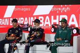 (L to R): Sergio Perez (MEX) Red Bull Racing; Max Verstappen (NLD) Red Bull Racing; and Fernando Alonso (ESP) Aston Martin F1 Team, in the post race FIA Press Conference. 05.03.2023. Formula 1 World Championship, Rd 1, Bahrain Grand Prix, Sakhir, Bahrain, Race Day.
