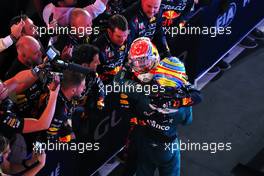 Race winner Max Verstappen (NLD) Red Bull Racing celebrates with third placed Fernando Alonso (ESP) Aston Martin F1 Team in parc ferme. 05.03.2023. Formula 1 World Championship, Rd 1, Bahrain Grand Prix, Sakhir, Bahrain, Race Day.