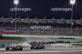 Max Verstappen (NLD) Red Bull Racing RB19 leads at the start of the race. 05.03.2023. Formula 1 World Championship, Rd 1, Bahrain Grand Prix, Sakhir, Bahrain, Race Day.