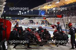 Zhou Guanyu (CHN) Alfa Romeo F1 Team C43 makes a pit stop. 05.03.2023. Formula 1 World Championship, Rd 1, Bahrain Grand Prix, Sakhir, Bahrain, Race Day.