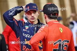 (L to R): Max Verstappen (NLD) Red Bull Racing in qualifying parc ferme with Charles Leclerc (MON) Ferrari. 04.03.2023. Formula 1 World Championship, Rd 1, Bahrain Grand Prix, Sakhir, Bahrain, Qualifying Day.
