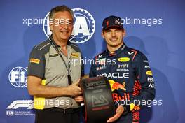 Max Verstappen (NLD) Red Bull Racing receives the Pirelli Pole Position Award from Mario Isola (ITA) Pirelli Racing Manager. 04.03.2023. Formula 1 World Championship, Rd 1, Bahrain Grand Prix, Sakhir, Bahrain, Qualifying Day.