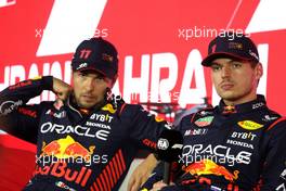 (L to R): Sergio Perez (MEX) Red Bull Racing and team mate Max Verstappen (NLD) Red Bull Racing in the post qualifying FIA Press Conference. 04.03.2023. Formula 1 World Championship, Rd 1, Bahrain Grand Prix, Sakhir, Bahrain, Qualifying Day.