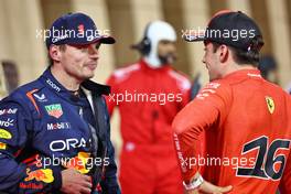 (L to R): Max Verstappen (NLD) Red Bull Racing in qualifying parc ferme with Charles Leclerc (MON) Ferrari. 04.03.2023. Formula 1 World Championship, Rd 1, Bahrain Grand Prix, Sakhir, Bahrain, Qualifying Day.