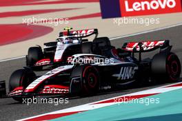 Kevin Magnussen (DEN) Haas VF-23 and team mate Nico Hulkenberg (GER) Haas VF-23. 04.03.2023. Formula 1 World Championship, Rd 1, Bahrain Grand Prix, Sakhir, Bahrain, Qualifying Day.