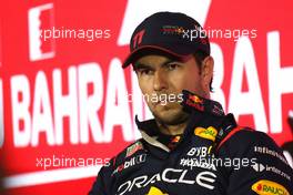 Sergio Perez (MEX) Red Bull Racing in the post qualifying FIA Press Conference. 04.03.2023. Formula 1 World Championship, Rd 1, Bahrain Grand Prix, Sakhir, Bahrain, Qualifying Day.