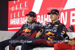 (L to R): Sergio Perez (MEX) Red Bull Racing and team mate Max Verstappen (NLD) Red Bull Racing in the post qualifying FIA Press Conference. 04.03.2023. Formula 1 World Championship, Rd 1, Bahrain Grand Prix, Sakhir, Bahrain, Qualifying Day.