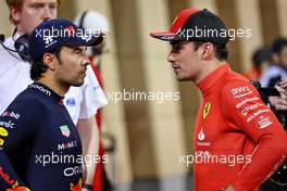 (L to R): Sergio Perez (MEX) Red Bull Racing in qualifying parc ferme with Charles Leclerc (MON) Ferrari. 04.03.2023. Formula 1 World Championship, Rd 1, Bahrain Grand Prix, Sakhir, Bahrain, Qualifying Day.