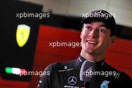 George Russell (GBR) Mercedes AMG F1 with the media. 04.03.2023. Formula 1 World Championship, Rd 1, Bahrain Grand Prix, Sakhir, Bahrain, Qualifying Day.