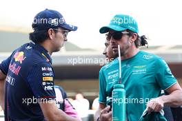 (L to R): Sergio Perez (MEX) Red Bull Racing and Fernando Alonso (ESP) Aston Martin F1 Team on the drivers' parade. 05.03.2023. Formula 1 World Championship, Rd 1, Bahrain Grand Prix, Sakhir, Bahrain, Race Day.