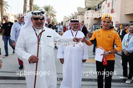 (L to R): Crown Prince Shaikh Salman bin Isa Hamad Al Khalifa (BRN) with Muhammed Al Khalifa (BRN) Bahrain Circuit Chairman and Lando Norris (GBR) McLaren. 05.03.2023. Formula 1 World Championship, Rd 1, Bahrain Grand Prix, Sakhir, Bahrain, Race Day.
