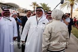 Crown Prince Shaikh Salman bin Isa Hamad Al Khalifa (BRN) with Bernie Ecclestone (GBR) (Right). 05.03.2023. Formula 1 World Championship, Rd 1, Bahrain Grand Prix, Sakhir, Bahrain, Race Day.