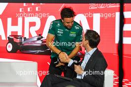Fernando Alonso (ESP) Aston Martin F1 Team with Tom Clarkson (GBR) Journalist  in the FIA Press Conference. 02.03.2023. Formula 1 World Championship, Rd 1, Bahrain Grand Prix, Sakhir, Bahrain, Preparation Day.