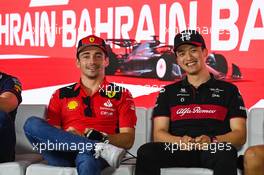(L to R): Charles Leclerc (MON) Ferrari and Zhou Guanyu (CHN) Alfa Romeo F1 Team, in the FIA Press Conference. 02.03.2023. Formula 1 World Championship, Rd 1, Bahrain Grand Prix, Sakhir, Bahrain, Preparation Day.