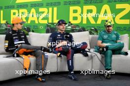 (L to R): Lando Norris (GBR) McLaren ; Max Verstappen (NLD) Red Bull Racing; and Fernando Alonso (ESP) Aston Martin F1 Team, in the post race FIA Press Conference. 05.11.2023. Formula 1 World Championship, Rd 21, Brazilian Grand Prix, Sao Paulo, Brazil, Race Day.