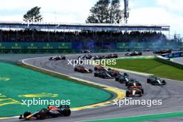 Max Verstappen (NLD) Red Bull Racing RB19 leads at the start of the race as Kevin Magnussen (DEN) Haas VF-23 and Alexander Albon (THA) Williams Racing FW45 crash. 05.11.2023. Formula 1 World Championship, Rd 21, Brazilian Grand Prix, Sao Paulo, Brazil, Race Day.