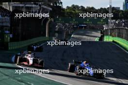 (L to R): Nico Hulkenberg (GER) Haas VF-23 and Alexander Albon (THA) Williams Racing FW45 battle for position. 04.11.2023. Formula 1 World Championship, Rd 21, Brazilian Grand Prix, Sao Paulo, Brazil, Sprint Day.