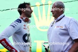 (L to R): Daniel Ricciardo (AUS) AlphaTauri with Dr Helmut Marko (AUT) Red Bull Motorsport Consultant on the grid. 04.11.2023. Formula 1 World Championship, Rd 21, Brazilian Grand Prix, Sao Paulo, Brazil, Sprint Day.