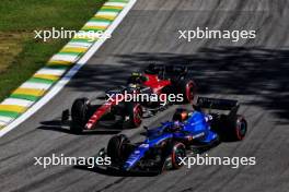 Alexander Albon (THA) Williams Racing FW45 and Zhou Guanyu (CHN) Alfa Romeo F1 Team C43 battle for position. 04.11.2023. Formula 1 World Championship, Rd 21, Brazilian Grand Prix, Sao Paulo, Brazil, Sprint Day.