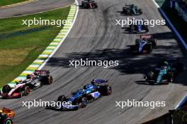 Kevin Magnussen (DEN) Haas VF-23 and Pierre Gasly (FRA) Alpine F1 Team A523 at the start of Sprint. 04.11.2023. Formula 1 World Championship, Rd 21, Brazilian Grand Prix, Sao Paulo, Brazil, Sprint Day.