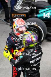 (L to R): Race winner Max Verstappen (NLD) Red Bull Racing celebrates with third placed Lewis Hamilton (GBR) Mercedes AMG F1 in parc ferme. 18.06.2023. Formula 1 World Championship, Rd 9, Canadian Grand Prix, Montreal, Canada, Race Day.