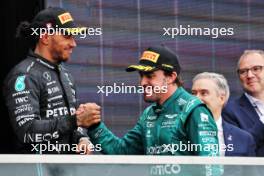 Fernando Alonso (ESP) Aston Martin F1 Team celebrates his second position with third placed Lewis Hamilton (GBR) Mercedes AMG F1 on the podium. 18.06.2023. Formula 1 World Championship, Rd 9, Canadian Grand Prix, Montreal, Canada, Race Day.