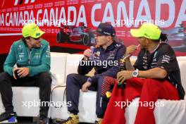 (L to R): Fernando Alonso (ESP) Aston Martin F1 Team; Max Verstappen (NLD) Red Bull Racing; and Lewis Hamilton (GBR) Mercedes AMG F1, in the post race FIA Press Conference. 18.06.2023. Formula 1 World Championship, Rd 9, Canadian Grand Prix, Montreal, Canada, Race Day.