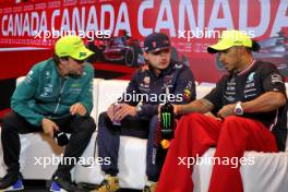 (L to R): Fernando Alonso (ESP) Aston Martin F1 Team; Max Verstappen (NLD) Red Bull Racing; and Lewis Hamilton (GBR) Mercedes AMG F1, in the post race FIA Press Conference. 18.06.2023. Formula 1 World Championship, Rd 9, Canadian Grand Prix, Montreal, Canada, Race Day.