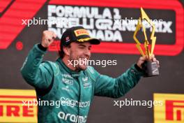 Fernando Alonso (ESP) Aston Martin F1 Team celebrates his second position on the podium. 18.06.2023. Formula 1 World Championship, Rd 9, Canadian Grand Prix, Montreal, Canada, Race Day.