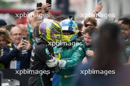 (L to R): Lewis Hamilton (GBR) Mercedes AMG F1 celebrates his third position in parc ferme with second placed Fernando Alonso (ESP) Aston Martin F1 Team. 18.06.2023. Formula 1 World Championship, Rd 9, Canadian Grand Prix, Montreal, Canada, Race Day.