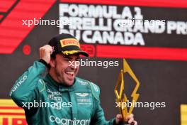 Fernando Alonso (ESP) Aston Martin F1 Team celebrates his second position on the podium. 18.06.2023. Formula 1 World Championship, Rd 9, Canadian Grand Prix, Montreal, Canada, Race Day.
